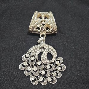 Vintage Silver-tone rhinestone peacock pendant. 